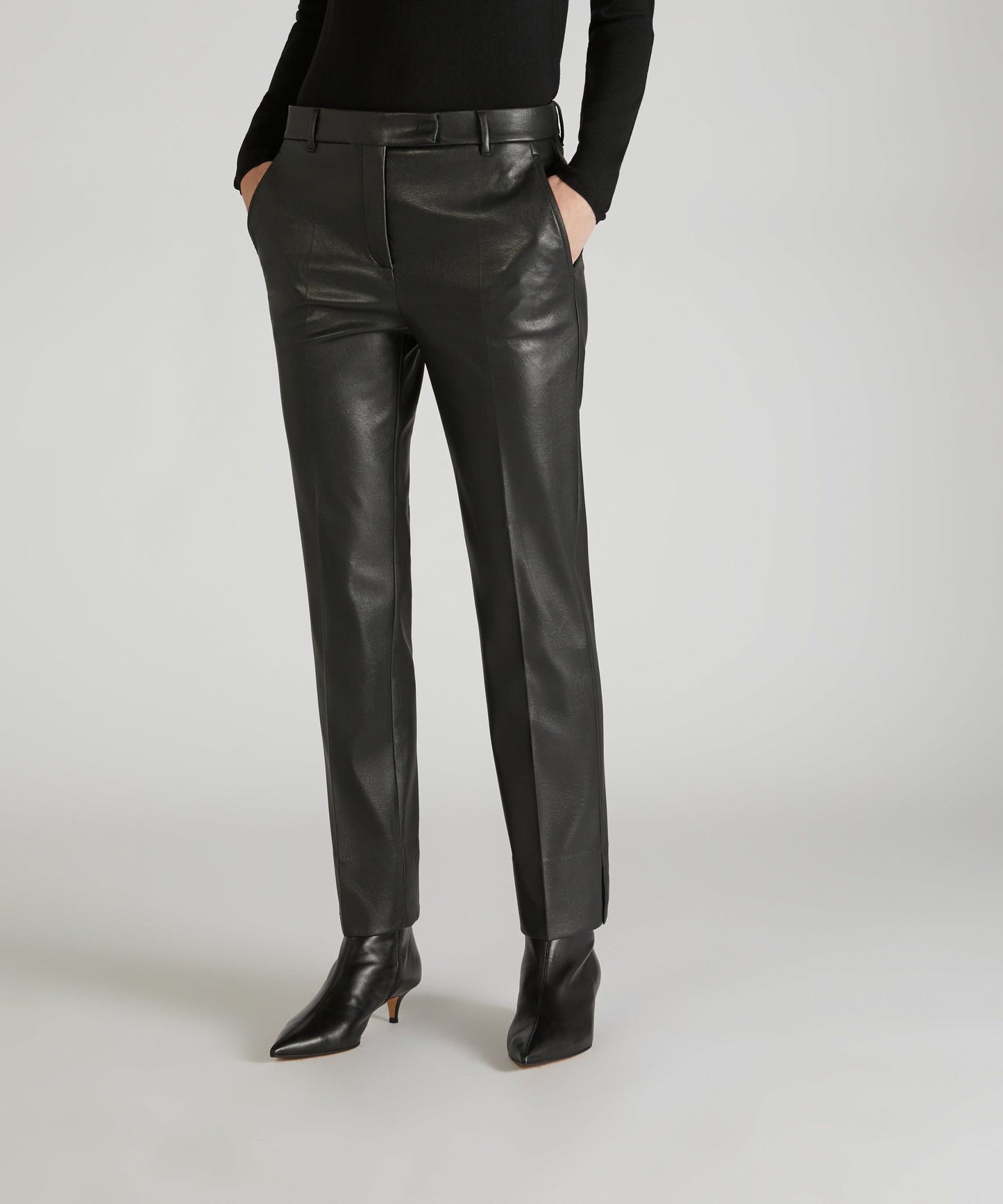 Slim-fit trousers in stretch faux leather