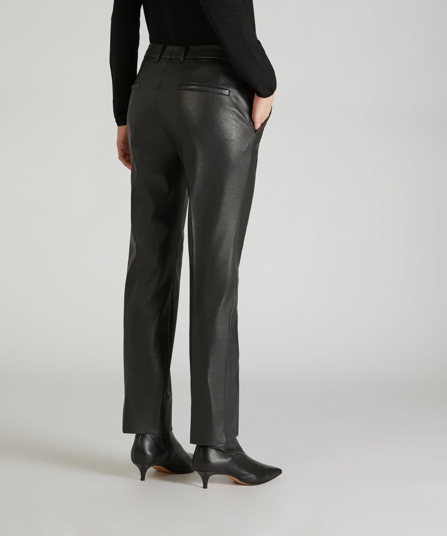 Slim-fit trousers in stretch faux leather