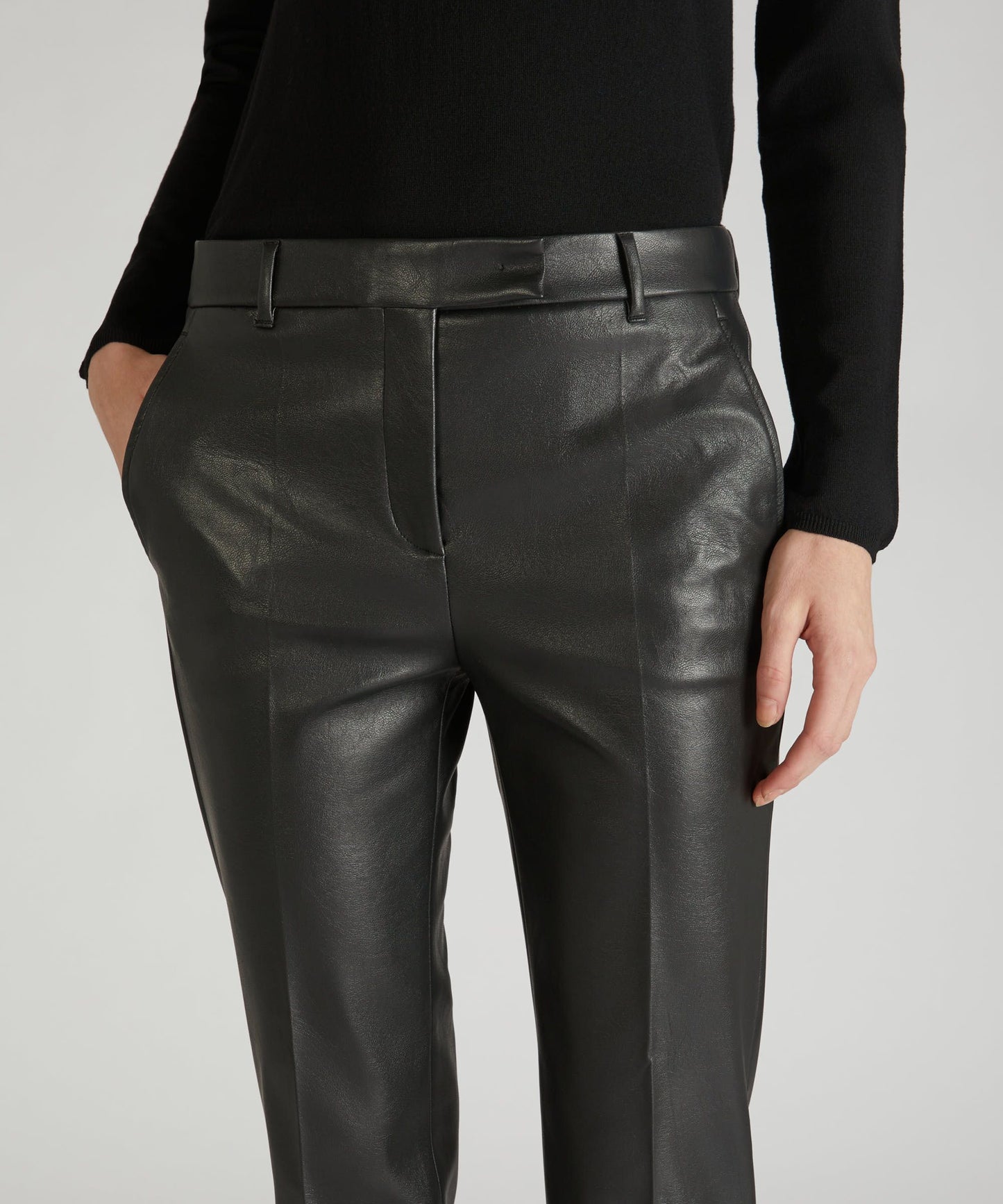 Slim-fit trousers in stretch faux leather