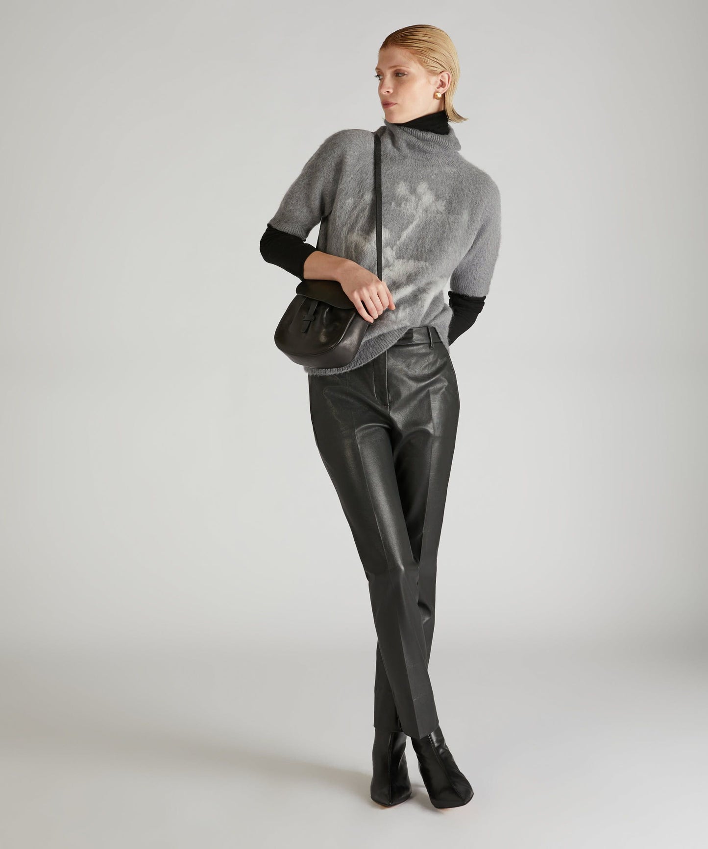 Slim-fit trousers in stretch faux leather